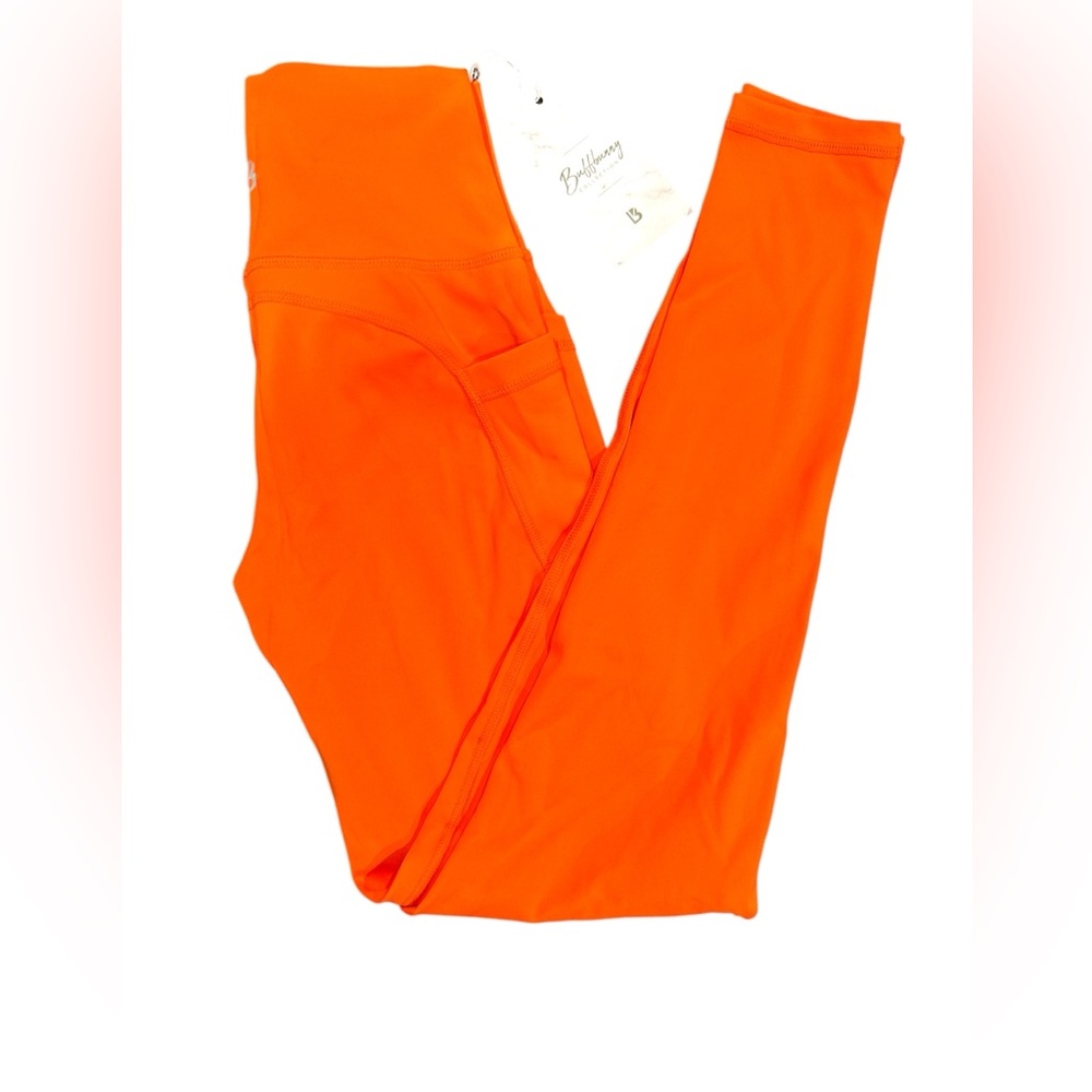 Buffbunny Vibrant Orange Athletic Leggings with pockets. Size Small